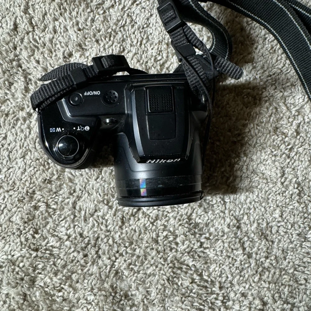 Nikon L105 12.1 MP Digital Camera with 15x Optical Zoom - Black